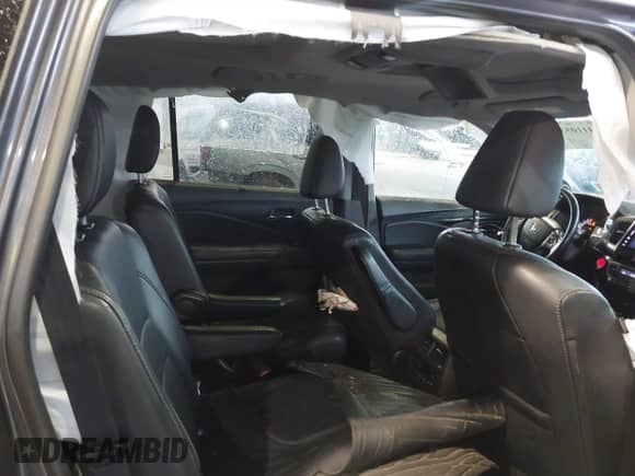 2018 Honda Pilot Elite z VIN 5FNYF6H06JB025867, wystawiony jako IAAI lot #41958994 z przebiegiem 94 479 mil mil oraz . Historia ofert i sprzedaży dostępna na DreamBid. Obrazek 8.