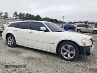 2007 Dodge Magnum R/T с VIN 2D4GV57267H853466, выставлен на аукционе Copart как лот 71221914 с пробегом 163 746 миль миль и Списание • Salvage title. История ставок и продаж доступна на DreamBid. Изображение 4.