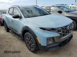 2024 Hyundai Santa Cruz XRT with VIN 5NTJDDDF9RH116121, listed as a Copart auction lot 76419174 with 1,843 mi miles and Salvage title. Bid and sale history available at DreamBid. Image 4.