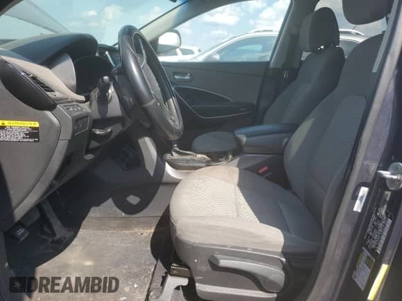 2015 Hyundai Santa Fe z VIN 5XYZTDLB7FG251328, wystawiony jako Copart lot #67758685 z przebiegiem Nie podano mil oraz Czysty tytuł • Clean title. Historia ofert i sprzedaży dostępna na DreamBid. Obrazek 7.