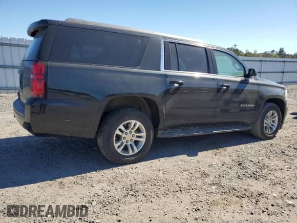 2020 Chevrolet Suburban LS with VIN 1GNSKGKC1LR209127, listed as a Copart auction lot 75593484 with 60,782 mi miles and Salvage title. Bid and sale history available at DreamBid. Image 3.