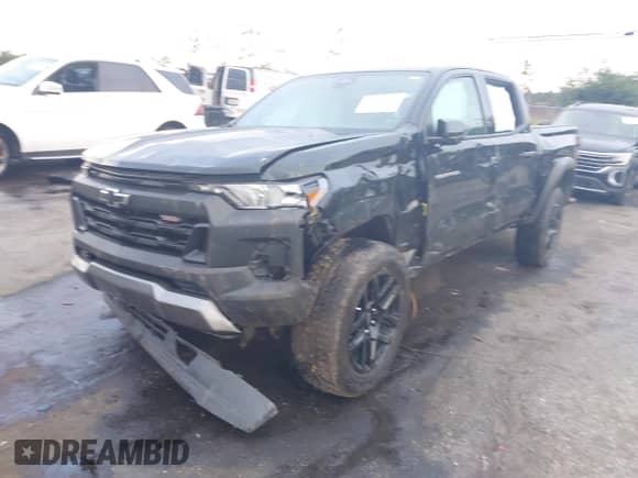2024 Chevrolet Colorado 4WD Trail Boss with VIN 1GCPTEEK3R1176660, listed as a IAAI auction lot 43340275 with 62,333 mi miles and . Bid and sale history available at DreamBid. Image 2.