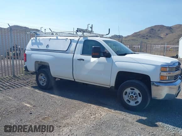 2015 Chevrolet Silverado 2500HD Work Truck with VIN 1GC0KUEG3FZ531558, listed as a IAAI auction lot 43226136 with 241,382 mi miles and . Bid and sale history available at DreamBid. Image 13.