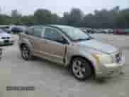 2010 Dodge Caliber SXT with VIN 1B3CB4HAXAD540088, listed as a Copart auction lot 68734845 with 153,998 mi miles and Salvage title. Bid and sale history available at DreamBid. Image 4.