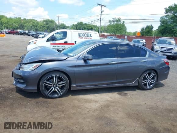 2017 Honda Accord Touring with VIN 1HGCR3F94HA002173, listed as a IAAI auction lot 42673267 with 147,086 mi miles and . Bid and sale history available at DreamBid. Image 14.
