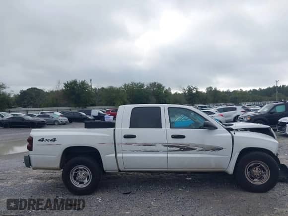 2005 Dodge Dakota ST с VIN 1D7HW28N45S195017, выставлен на аукционе IAAI как лот 41203397 с пробегом 223 015 миль миль и . История ставок и продаж доступна на DreamBid. Изображение 12.