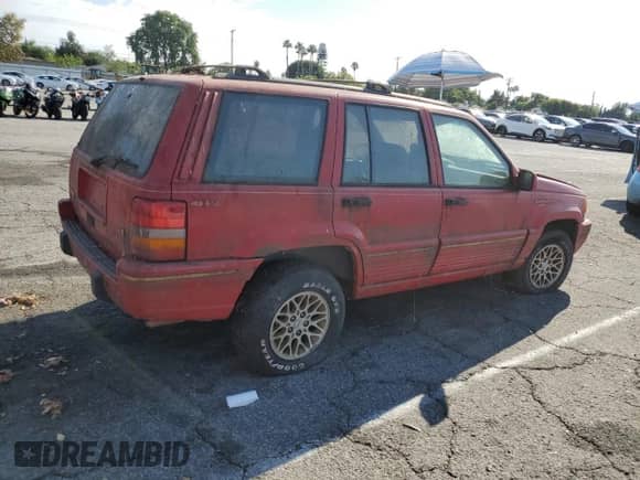 1994 Jeep Grand Cherokee Limited z VIN 1J4GZ78Y2RC101344, wystawiony jako Copart lot #83863965 z przebiegiem 129 830 mil mil oraz Czysty tytuł • Clean title. Historia ofert i sprzedaży dostępna na DreamBid. Obrazek 3.