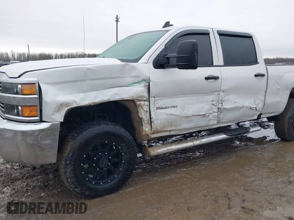 2017 Chevrolet Silverado 2500HD Work Truck z VIN 1GC1KUEG5HF222795, wystawiony jako IAAI lot #41717477 z przebiegiem 223 784 mil mil oraz . Historia ofert i sprzedaży dostępna na DreamBid. Obrazek 6.
