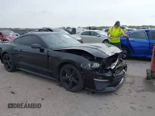 2023 Ford Mustang EcoBoost with VIN 1FA6P8TH4P5112129, listed as a IAAI auction lot 42065880 with 27,716 mi miles and . Bid and sale history available at DreamBid. Image 1.