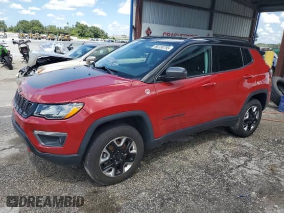 2017 Jeep Compass Trailhawk with VIN 3C4NJDDB9HT674796, listed as a Copart auction lot 80738795 with 58,865 mi miles and Salvage title. Bid and sale history available at DreamBid. Image 1.