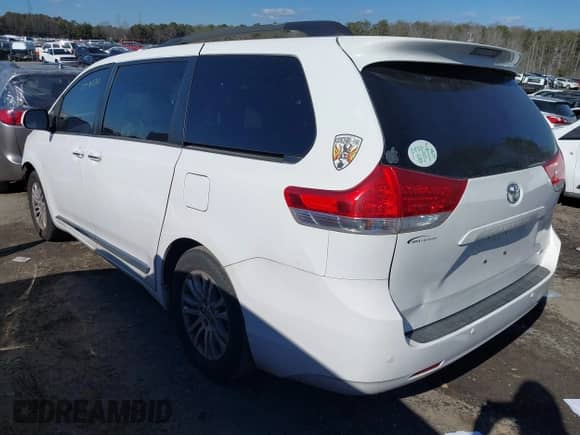 2013 Toyota Sienna XLE AAS with VIN 5TDYK3DC1DS341977, listed as a IAAI auction lot 41418311 with Not provided miles and . Bid and sale history available at DreamBid. Image 3.