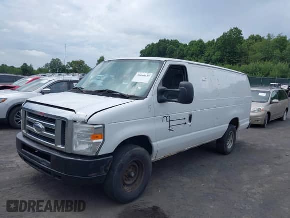 2013 Ford Econoline Cargo Commercial with VIN 1FTSS3EL0DDA70863, listed as a IAAI auction lot 39840137 with 525,498 mi miles and . Bid and sale history available at DreamBid. Image 2.