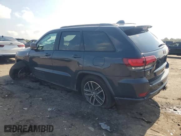 2018 Jeep Grand Cherokee Trailhawk с VIN 1C4RJFLG4JC334712, выставлен на аукционе Copart как лот 68918665 с пробегом 165 519 миль миль и Списание • Salvage title. История ставок и продаж доступна на DreamBid. Изображение 2.