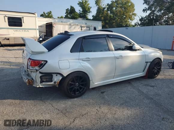 2012 Subaru WRX WRX Premium with VIN JF1GV7F69CG030247, listed as a Copart auction lot 68512615 with 130,053 mi miles and Salvage title. Bid and sale history available at DreamBid. Image 3.