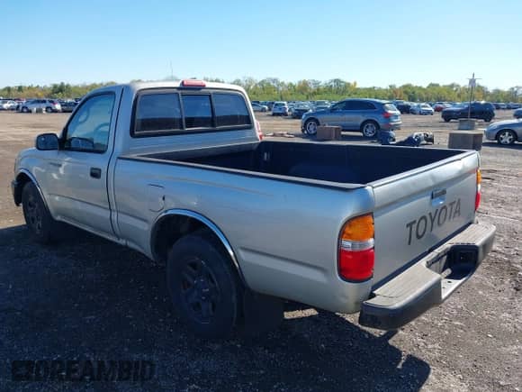 2002 Toyota Tacoma with VIN 5TENL42N32Z074285, listed as a IAAI auction lot 43438609 with 160,565 mi miles and . Bid and sale history available at DreamBid. Image 3.