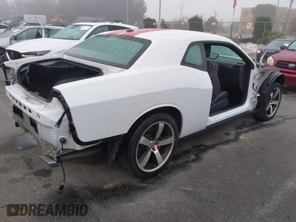 2013 Dodge Challenger SRT-8 with VIN 2C3CDYCJ7DH529388, listed as a IAAI auction lot 41616384 with Not provided miles and . Bid and sale history available at DreamBid. Image 4.