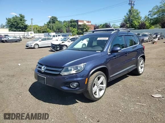 2016 Volkswagen Tiguan SEL z VIN WVGBV7AX0GW077386, wystawiony jako Copart lot #70747695 z przebiegiem 66 699 mil mil oraz Szkoda całkowita • Salvage title. Historia ofert i sprzedaży dostępna na DreamBid. Obrazek 13.