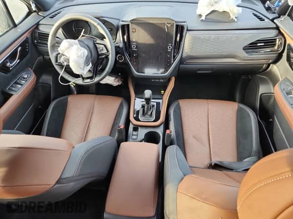 2025 Subaru Forester Touring z VIN JF2SLDTC8SH477603, wystawiony jako Copart lot #59725775 z przebiegiem 9 440 mil mil oraz Szkoda całkowita • Salvage title. Historia ofert i sprzedaży dostępna na DreamBid. Obrazek 8.