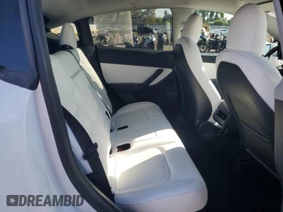 2021 Tesla Model Y Long Range with VIN 5YJYGDEEXMF276123, listed as a Copart auction lot 84660505 with 105,172 mi miles and Salvage title. Bid and sale history available at DreamBid. Image 10.