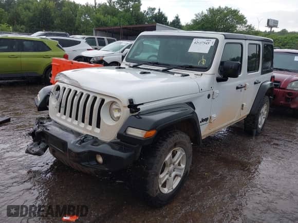 2023 Jeep Wrangler Unlimited Sport with VIN 1C4HJXKN6PW505727, listed as a IAAI auction lot 42657545 with 77,727 mi miles and . Bid and sale history available at DreamBid. Image 2.