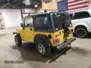 2000 Jeep Wrangler Sport z VIN 1J4FA49S7YP735946, wystawiony jako Copart lot #68370665 z przebiegiem 201 407 mil mil oraz Szkoda całkowita • Salvage title. Historia ofert i sprzedaży dostępna na DreamBid. Obrazek 2.