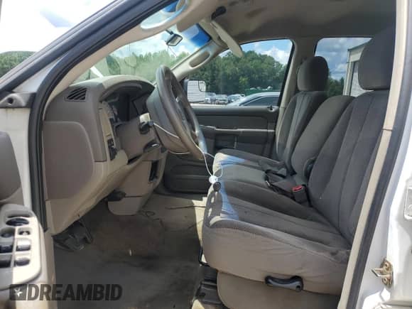 2003 Dodge 1500 ST with VIN 1D7HA18N73J511165, listed as a Copart auction lot 68720355 with 229,480 mi miles and Salvage title. Bid and sale history available at DreamBid. Image 7.
