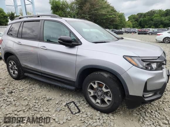 2022 Honda Passport TrailSport z VIN 5FNYF8H65NB017409, wystawiony jako Copart lot #65361335 z przebiegiem Nie podano mil oraz Szkoda całkowita • Salvage title. Historia ofert i sprzedaży dostępna na DreamBid. Obrazek 5.