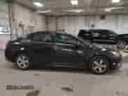 2013 Chevrolet Cruze 1LT z VIN 1G1PC5SB2D7316927, wystawiony jako IAAI lot #43012100 z przebiegiem 136 261 mil mil oraz . Historia ofert i sprzedaży dostępna na DreamBid. Obrazek 13.