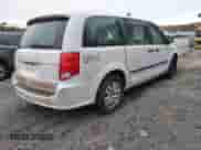 2014 Dodge Grand Caravan SE with VIN 2C4RDGBG6ER458881, listed as a IAAI auction lot 43574110 with 189,082 mi miles and . Bid and sale history available at DreamBid. Image 4.