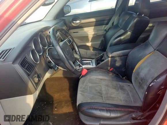 2007 Dodge Charger SRT-8 с VIN 2B3LA73W37H669857, выставлен на аукционе Copart как лот 57144425 с пробегом 169 933 миль миль и Чистый • Clean title. История ставок и продаж доступна на DreamBid. Изображение 7.