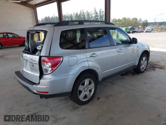 2009 Subaru Forester X with VIN JF2SH63619H783687, listed as a IAAI auction lot 43368886 with 139,346 mi miles and . Bid and sale history available at DreamBid. Image 4.