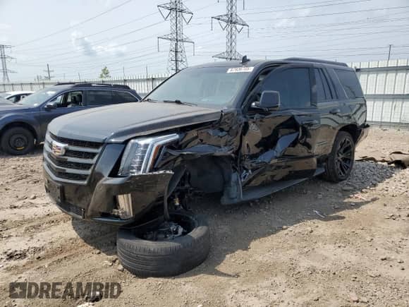 2018 Cadillac Escalade Luxury with VIN 1GYS4BKJ4JR301005, listed as a Copart auction lot 67936705 with Not provided miles and Salvage title. Bid and sale history available at DreamBid. Image 1.
