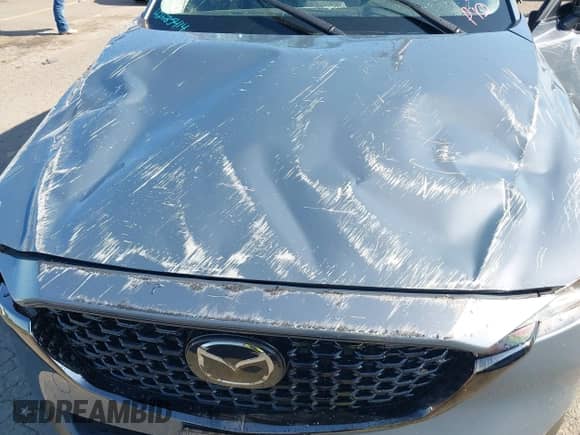 2025 Mazda CX-5 S Carbon Edition z VIN JM3KFBCM0S0575730, wystawiony jako IAAI lot #42685414 z przebiegiem Nie podano mil oraz . Historia ofert i sprzedaży dostępna na DreamBid. Obrazek 10.