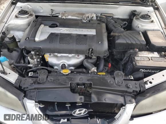 2005 Hyundai Elantra GLS с VIN KMHDN46D75U121902, выставлен на аукционе Copart как лот 89638425 с пробегом 157 879 миль миль и Списание • Salvage title. История ставок и продаж доступна на DreamBid. Изображение 11.