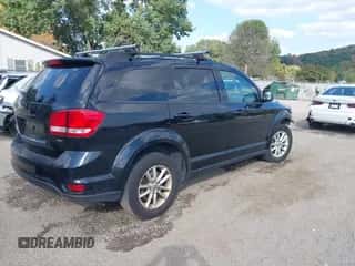2014 Dodge Journey SXT with VIN 3C4PDCBG0ET141000, listed as a IAAI auction lot 43255379 with 199,750 mi miles and . Bid and sale history available at DreamBid. Image 4.
