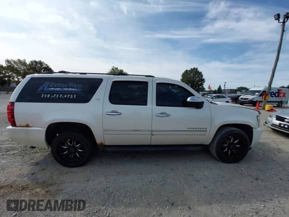 2011 Chevrolet Suburban LTZ с VIN 1GNSKKE30BR293390, выставлен на аукционе IAAI как лот 43187743 с пробегом 119 974 миль миль и . История ставок и продаж доступна на DreamBid. Изображение 13.