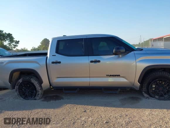 2024 Toyota Tundra SR5 with VIN 5TFLA5DB6RX163405, listed as a IAAI auction lot 43237590 with 54,123 mi miles and . Bid and sale history available at DreamBid. Image 13.