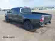 2013 Toyota Tacoma PreRunner with VIN 3TMKU4HN4DM037642, listed as a IAAI auction lot 41524081 with 149,621 mi miles and . Bid and sale history available at DreamBid. Image 3.