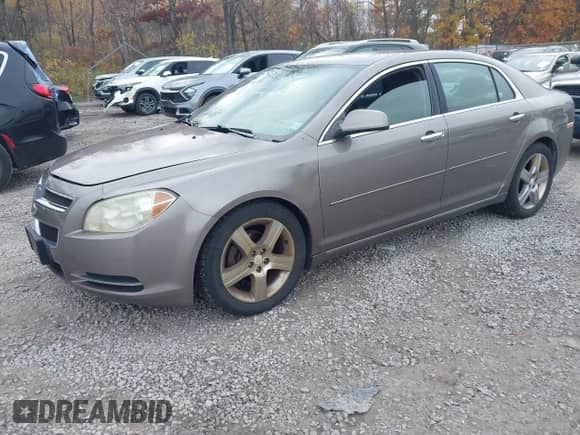 2012 Chevrolet Malibu 1LT with VIN 1G1ZC5E05CF182597, listed as a IAAI auction lot 43543908 with 92,448 mi miles and . Bid and sale history available at DreamBid. Image 2.