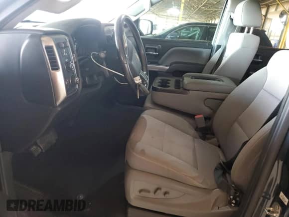 2018 Chevrolet Silverado 1500 LT with VIN 3GCUKREC9JG570580, listed as a Copart auction lot 69575445 with 106,245 mi miles and Salvage title. Bid and sale history available at DreamBid. Image 7.