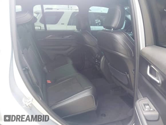 2023 Jeep Grand Cherokee Altitude with VIN 1C4RJGAG4P8909010, listed as a IAAI auction lot 43277728 with 24,293 mi miles and . Bid and sale history available at DreamBid. Image 8.