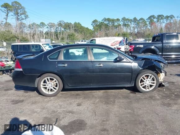 2012 Chevrolet Impala LTZ with VIN 2G1WC5E36C1162394, listed as a IAAI auction lot 41602380 with 146,768 mi miles and . Bid and sale history available at DreamBid. Image 12.