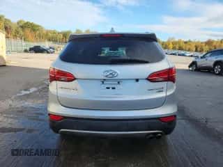 2014 Hyundai Santa Fe z VIN 5XYZUDLA4EG226776, wystawiony jako Copart lot #86997625 z przebiegiem 135 442 mil mil oraz Szkoda całkowita • Salvage title. Historia ofert i sprzedaży dostępna na DreamBid. Obrazek 6.