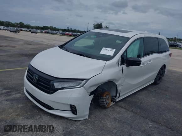 2023 Honda Odyssey Sport z VIN 5FNRL6H7XPB063069, wystawiony jako IAAI lot #42234366 z przebiegiem 28 580 mil mil oraz . Historia ofert i sprzedaży dostępna na DreamBid. Obrazek 17.