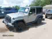 2015 Jeep Wrangler Sport with VIN 1C4AJWAG2FL507778, listed as a IAAI auction lot 42665428 with 126,554 mi miles and . Bid and sale history available at DreamBid. Image 2.