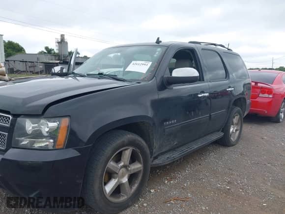 2012 Chevrolet Tahoe LT with VIN 1GNSCBE05CR211898, listed as a IAAI auction lot 42612993 with 233,367 mi miles and . Bid and sale history available at DreamBid. Image 17.