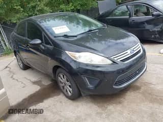 2011 Ford Fiesta SE z VIN 3FADP4BJ2BM153298, wystawiony jako IAAI lot #43130466 z przebiegiem 161 794 mil mil oraz . Historia ofert i sprzedaży dostępna na DreamBid. Obrazek 1.
