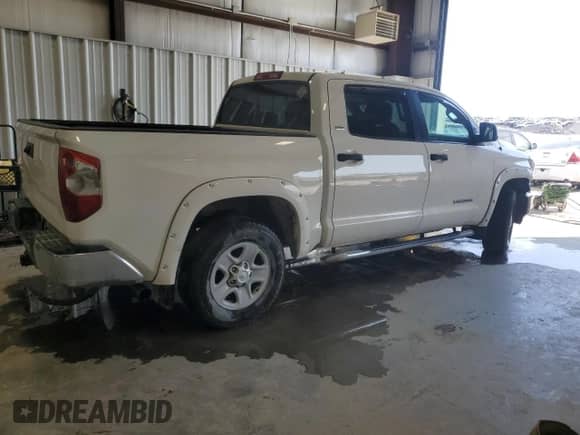 2018 Toyota Tundra SR5 with VIN 5TFDM5F14JX079412, listed as a Copart auction lot 48673955 with 128,801 mi miles and Clean title. Bid and sale history available at DreamBid. Image 3.