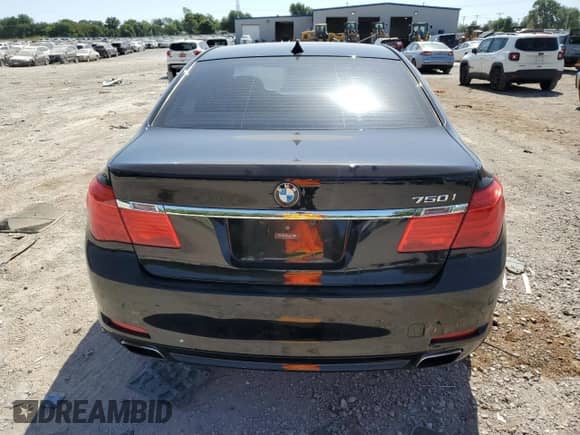 2012 BMW 7 Series 750i xDrive с VIN WBAKC6C50CC397154, выставлен на аукционе Copart как лот 66981905 с пробегом 162 379 миль миль и Списание • Salvage title. История ставок и продаж доступна на DreamBid. Изображение 6.
