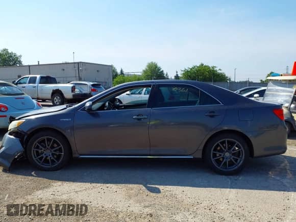 2013 Toyota Camry LE z VIN 4T1BD1FK4DU069294, wystawiony jako IAAI lot #42660361 z przebiegiem 189 304 mil mil oraz . Historia ofert i sprzedaży dostępna na DreamBid. Obrazek 14.